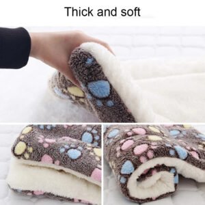 Cozy blanket with colorful paw prints