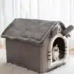 Cozy plush puppy hideout dog bed set up in a cozy living room environment