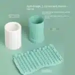 Side view of pet paw cleaner cup with a teal outer shell and textured grip surface